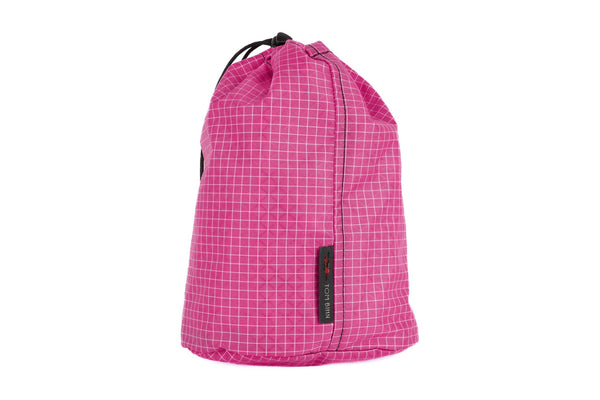 A Size 3 Cerise (bright pink with white grid) 200 Halcyon Travel Stuff Sack.